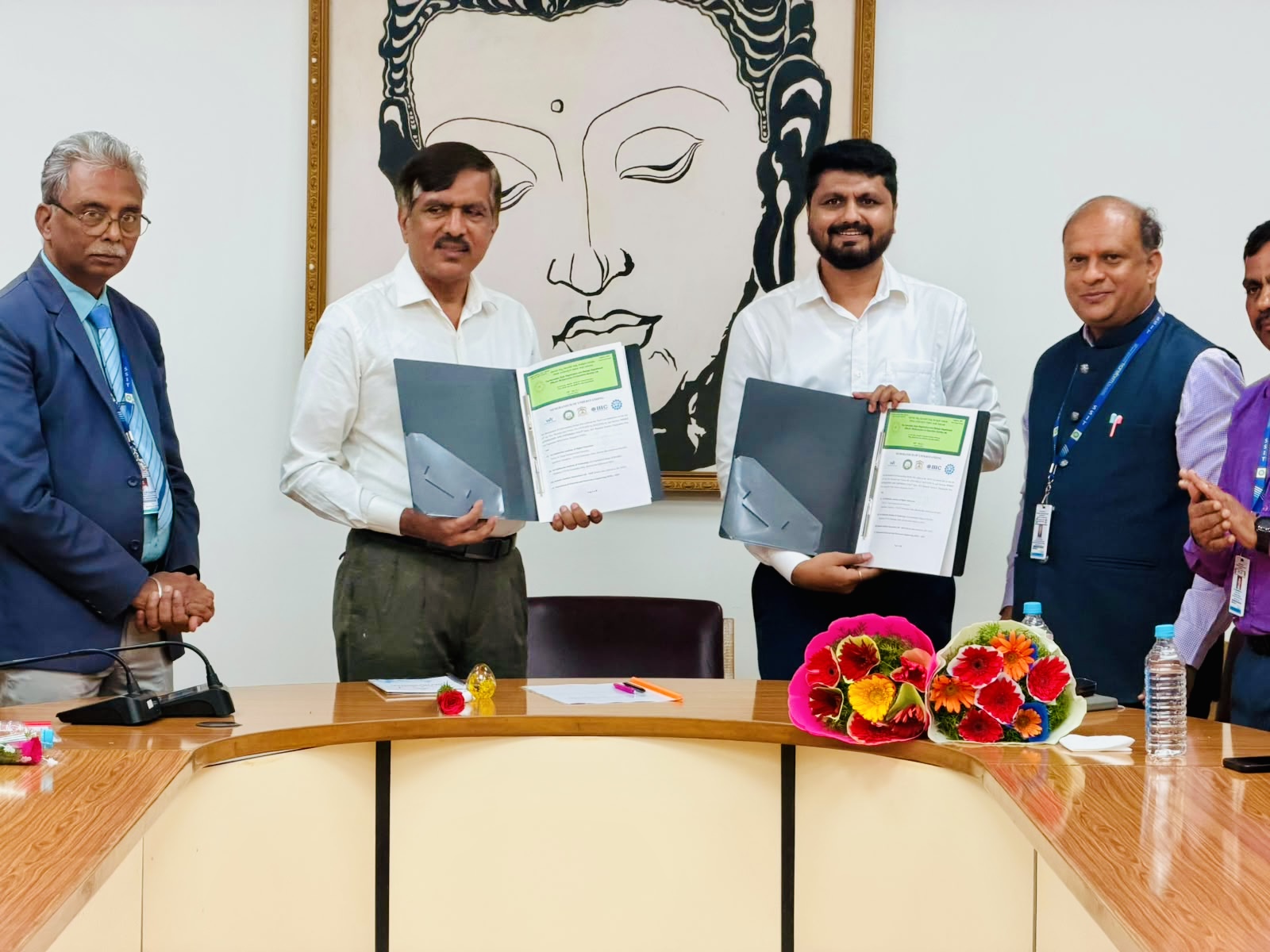 Exchange of MoU documents at Sri Siddhartha Academy